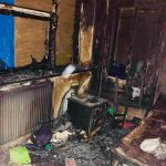 The aftermath of devastation: This bedroom has suffered extensive fire and soot damage, a stark reminder of the impact of fire on our lives. Recovery begins here.